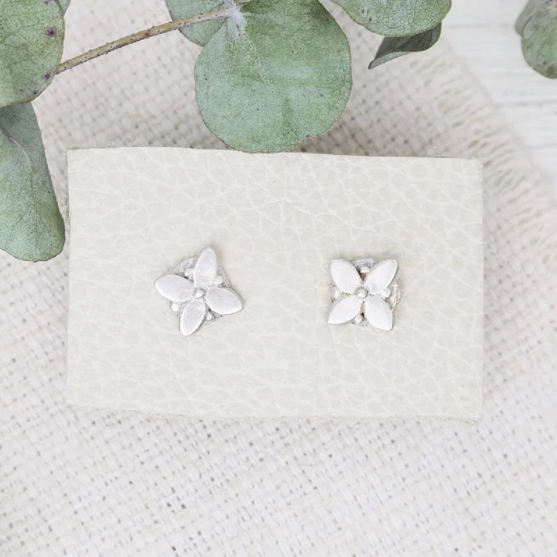 Designer Drop Earrings For High-Fashion Looks-Matte Silver Geometric Floral Stud Earrings