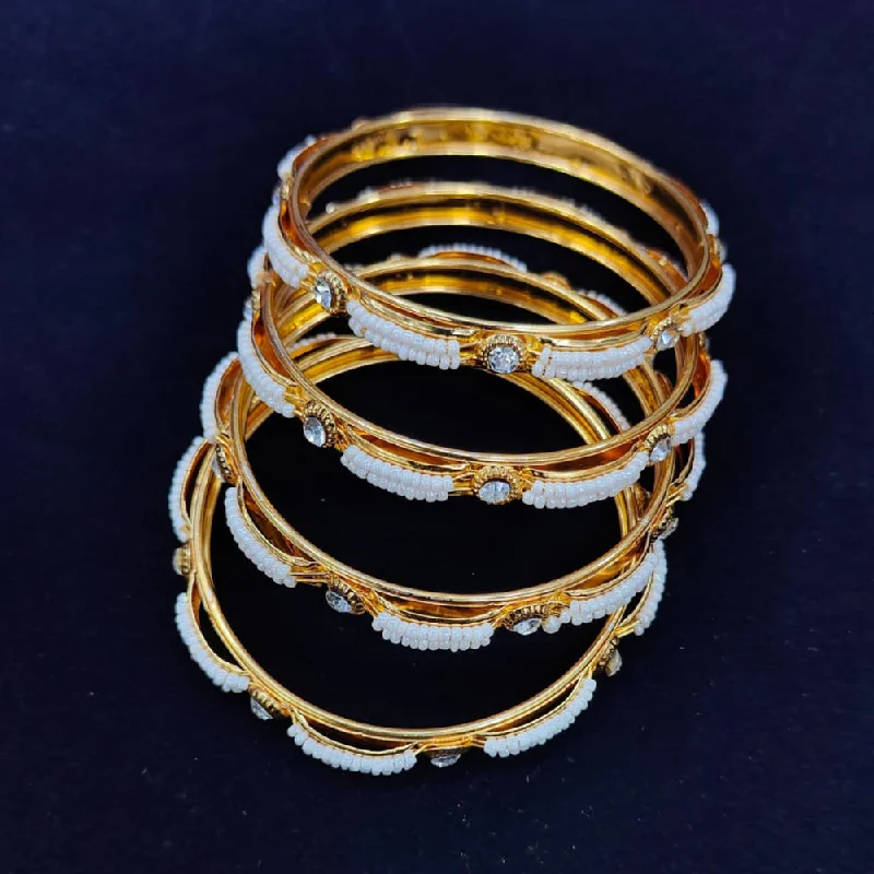 Sparkling Sapphire Bangles For Timeless Elegance-Pooja Bangles Gold Plated Austrian Stone And Pearls Bangles  Set