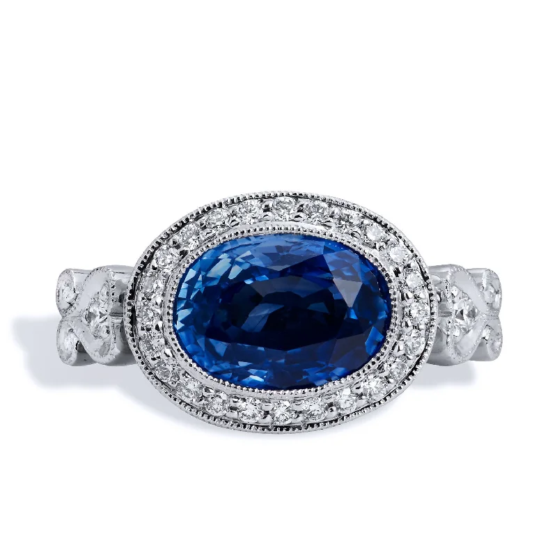 Simple Engagement Bands For Minimalist Brides-4.18 Carat Oval Sapphire And Diamond Pave Ring