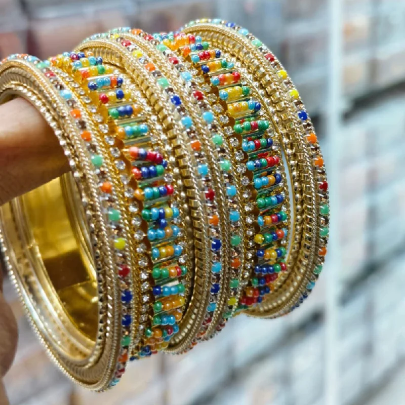 Simple Platinum Bangles For Timeless Elegance-Kavita Art Gold Plated Austrian Stone And Pearls Bangles Set